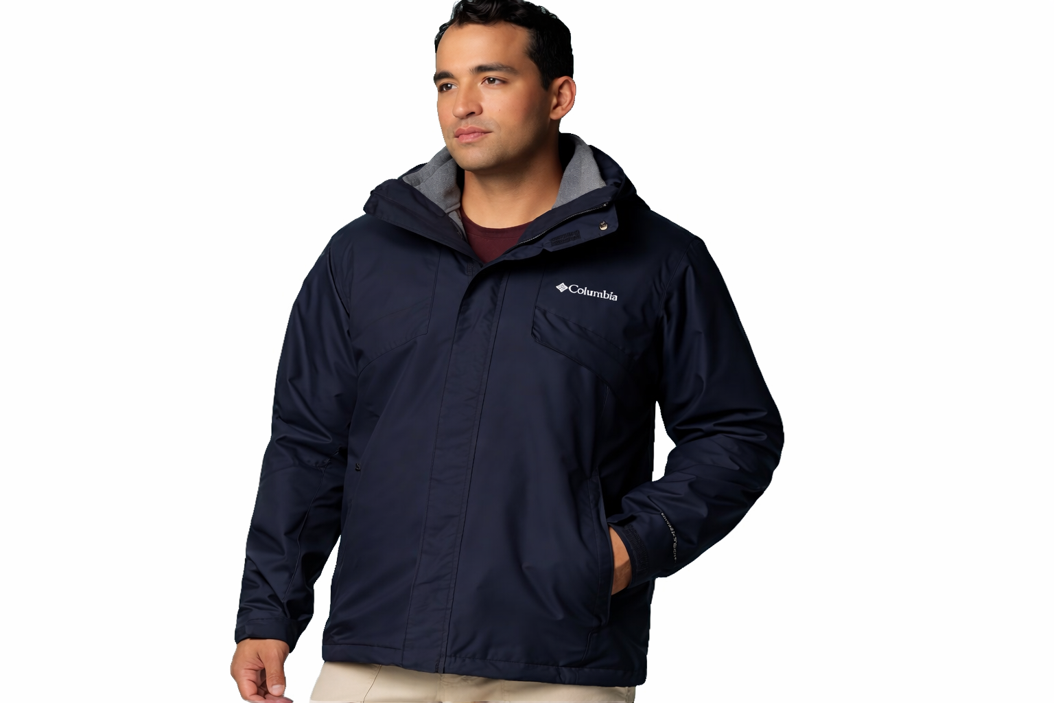 Man wearing one of the best winter jackets for extreme cold, insulated navy blue winter parka designed for warmth and wind protection